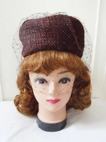 Cappello portapillole marrone