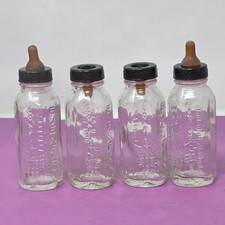 Set 4 biberon vintage Evenflo