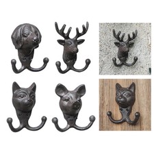 Ganci da parete con statuetta