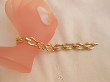 Bracciale firmato NAPIER PAT. 4.774.743 metallo dorato