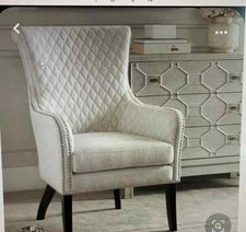 Comoda sedia ad ala in tessuto