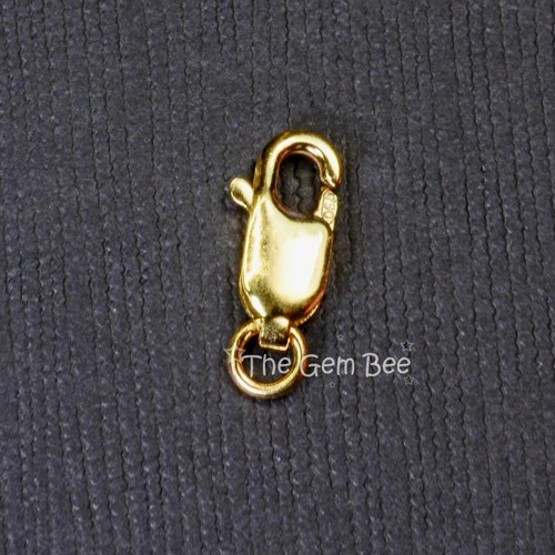 Chiusura aragosta oro - in,