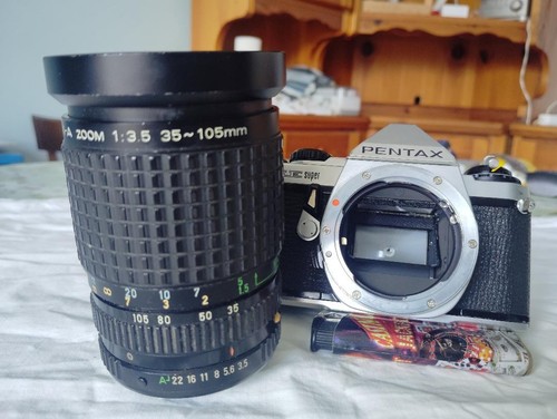 Pentax super con obiettivo - me,