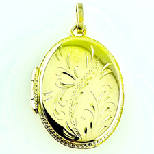 750 18KT GOLD PHOTO HOLDER