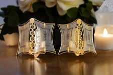 Coppia di appliques con gocce di cristalli e vetri satinati a due luci