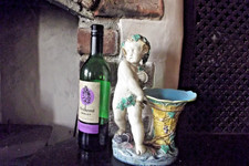 Antico putti in maiolica