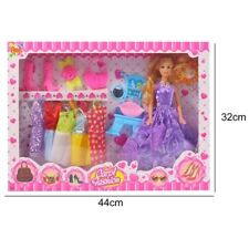 BAMBOLA MODELLA CON 6 VESTITI