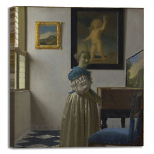 Vermeer donna alla spinetta