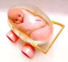 Neonato in carrozzina 70s Hk