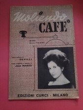 Mina Moliendo Cafe Spartito