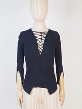 Maglia stringata a costine