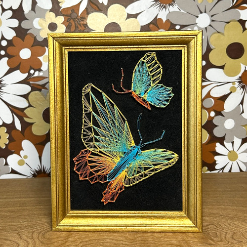 Vintage farfalla stringa arte