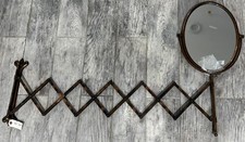 Antico specchio ovale da