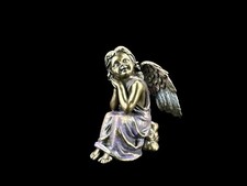 FIGURA DI ANGELO PENSIVO -