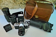Fotocamera Fujica AX-3. X-Fujinar Z 80-200 mm, Tamron 28-70 mm, Fujinon-x 1,6 55 mm, altro