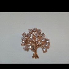 Spilla gioiello colore oro con