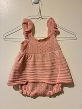 Pagliaccetto in maglia rosa