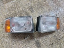 COPPIA FANALI FARI ANTERIORI CARELLO LANCIA DELTA 79 - 86 PRIMA SECONDA SERIE