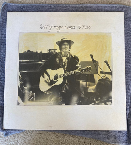 Neil young comes - young, time
