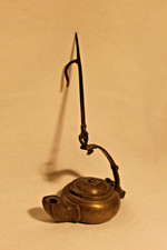 Lumino ad olio in bronzo