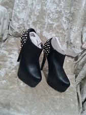 Scarpe alla caviglia tacco