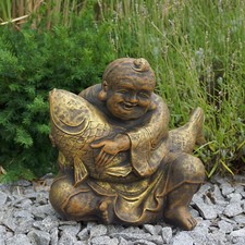 Statua Buddha con pesce koi