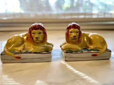 Statuine fermalibri leone