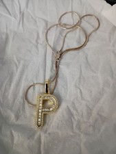 Ciondolo P diamante creato in