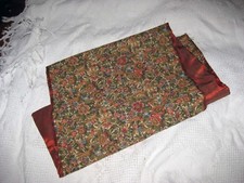 centrotavola "fiorito" cm.110 per cm.36 parzialmente scucito