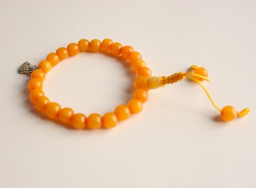 Bracciale buddista finta ambra - bracciale,