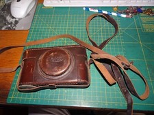 strepitosa antica macchina fotografica leica  con custodia in condizioni uniche