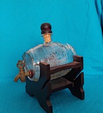 dispenser in vetro per liquore con rubinetto e base in legno