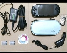 Sony Playstation portable PSP 3004 slim & lite, nera. usata e funzionante.