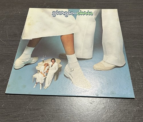 Giorgio moroder and chris - moroder,