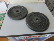 Due pesi da 5 kg " Casa dello sport Arezzo " usati diametro 22 cm 