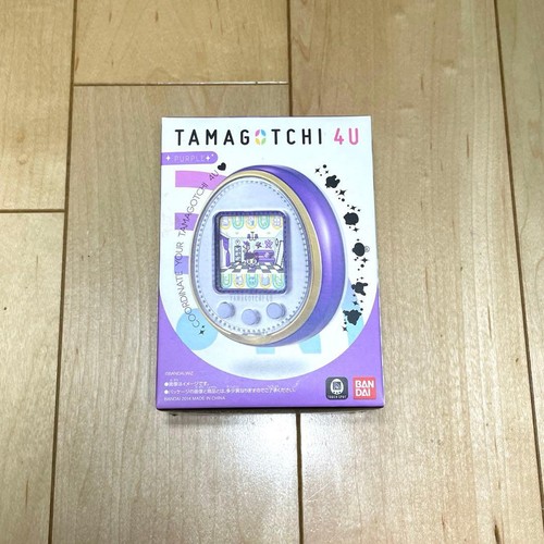 Tamagotchi viola con - 4u,