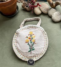 Borsa rotonda in lino con