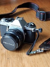 Reflex ME-Super Pentax , zoom dedicato 35/70 , flash prof. Metz 45TC , borsa