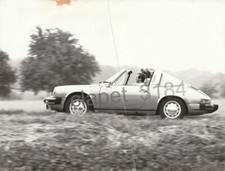 Porsche 911 photo b/w people