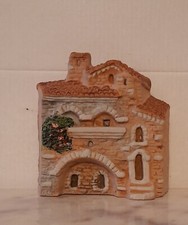 Decorazione da parete in terracotta  cm. 9x9 circa