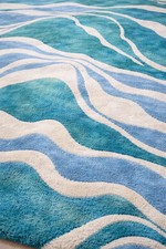 Tappeto in lana trapuntato a