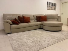 divano moderno in pelle “primo fiore” + tappetato abbinato 