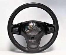 VOLANTE  P/COMANDI RADIO 13230415 OPEL CORSA (S07) (01/11>05/15<) RICAMBIO USATO