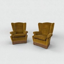 Coppia di poltrone con frange