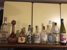 9 bottiglie vuote liquori vari