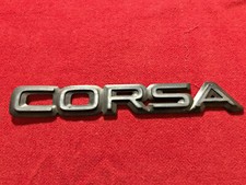 OPEL CORSA 90127769 LOGO SIGLA SCRITTA STEMMA FREGIO EMBLEMA TARGHETTA BADGE NOM