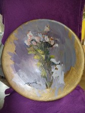 piatto in terracotta con fiori