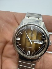 Très belle montre homme ELVIA