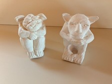 Coppia di 2 statue sedute