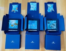SWAROVSKI MERAVIGLIE DEL MARE TRILOGIA ARMONIA ETERNITÀ COMUNITÀ CAPESANTE/PLACCA